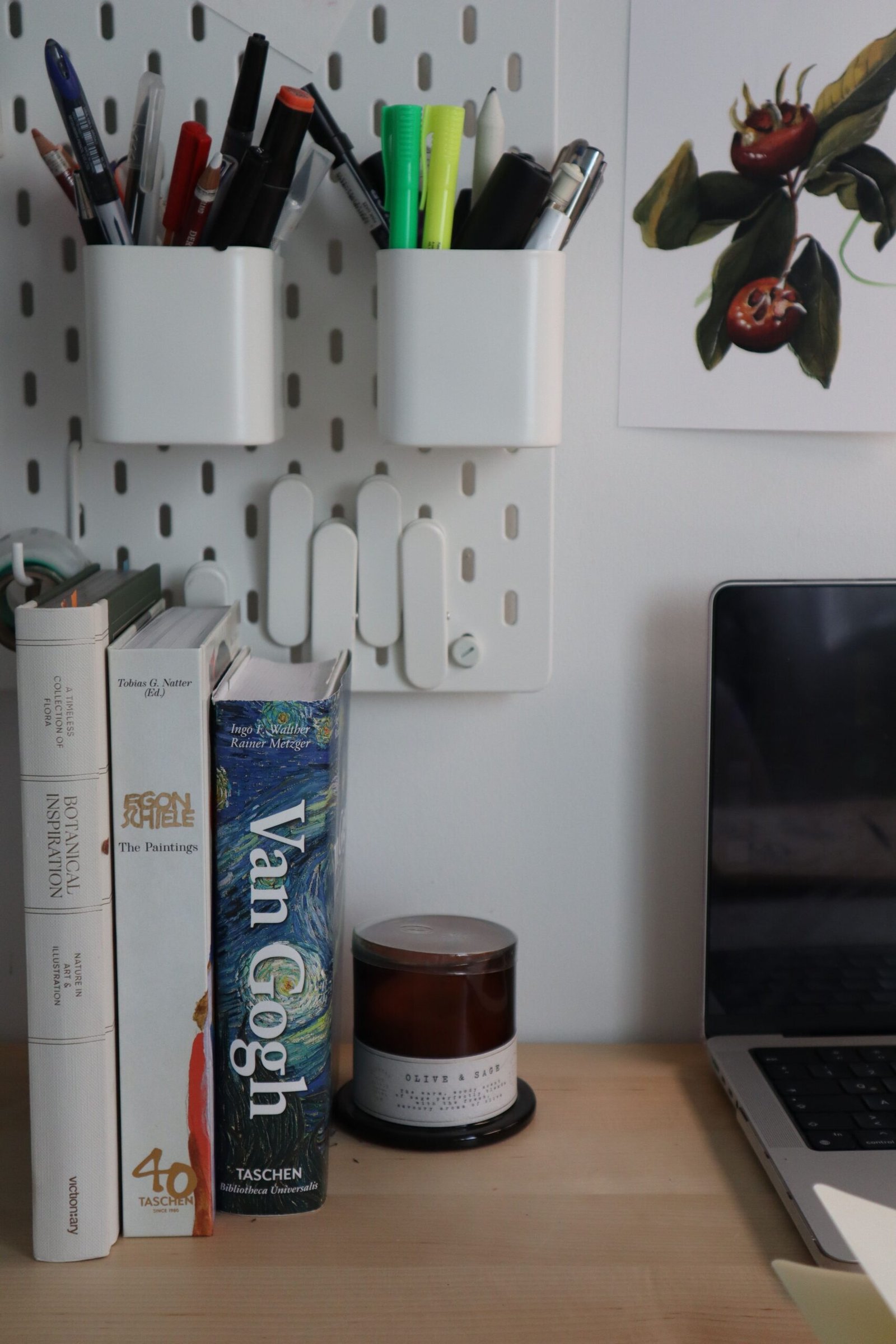 Organized home office desk setup with stationery kept off the main work surface